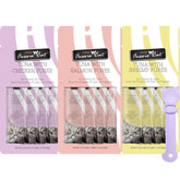 Fussie Cat Premium Puree Tuna Salmon tube close-up shows creamy texture for picky eaters.