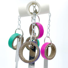 GILYGI cardboard rings entice birds with color and shredding opportunities.