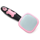 Glendan dog and cat grooming brush pink front view highlights ergonomic grip for easy brushing.
