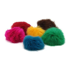 GoCat kitten plays with a fur ball, showcasing easy carry and chase.