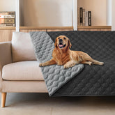Gogobunny dog blanket showing waterproof outer layer protecting furniture from spills