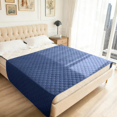 Gogobunny furniture protector blanket on sofa guards against scratches and messes.