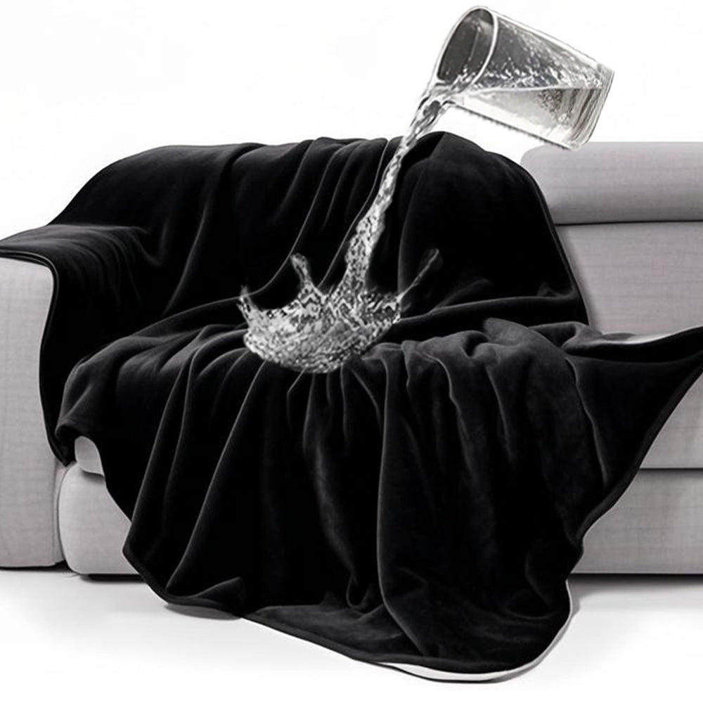 gogobunny waterproof bed blanket on bed protects mattress from spills and pet fur.