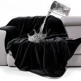 gogobunny waterproof bed blanket on bed protects mattress from spills and pet fur.