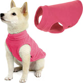 Gooby Stretch Fleece Vest pink dog sweater on dog provides snug warmth during chilly walks.
