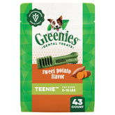 Greenies Teenie Sweet Potato Dental Treats pouch on countertop, promoting fresh breath and small-dog dental care.