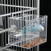 GURECOD Automatic Bird Feeder mounted outside the cage for tidy feeding.