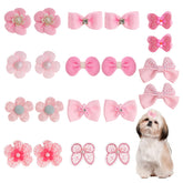 Gvhntk 20-piece light pink dog bow set close-up with rhinestones for added sparkle.