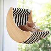 HAPYKITYS Moon shelf assembly shows sturdy mounting for safe indoor lounging.