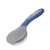 Harrison Howard ShineWell brush handle close-up showing ergonomic grip for comfortable grooming