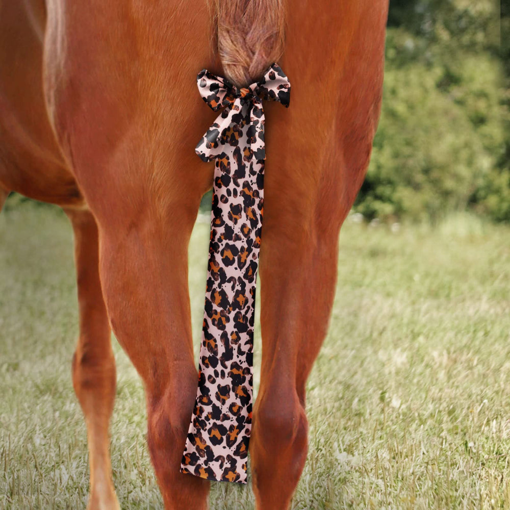 Harrison Howard stretchy tail bag in leopard pattern showing stylish grooming option
