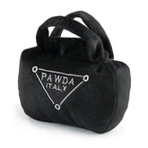 Haute Diggity Dog Pawda Handbag squeaker toy delivers playful stimulation during fetch and snuggle sessions.