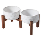 Havniva ceramic raised double bowls with acacia stand elevate feeding and complement decor.