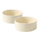 Havniva beige ceramic cat bowls provide stable meals with easy cleanup.