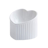 HCHLQLZ white ceramic raised cat bowls tilted front view for comfortable feeding