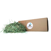 High Desert Orchard Grass Hay packaging in a cardboard box keeps hay fresh and easy to store.