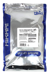 Hikari cichlid gold pellets pack with color-enhancing formula for vibrant fins.