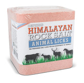 Himalayan Secrets compressed pink salt lick outdoors showing durability for livestock