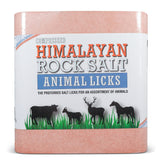 Himalayan Secrets pink salt lick outdoors; durable mineral block for livestock.