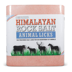 Himalayan Secrets pink salt lick outdoors; durable mineral block for livestock.