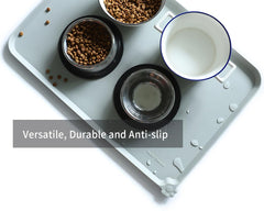Hoki Found extra-high raised-edge mat prevents spills from reaching floors.