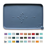 Hoki Found feeding mat high lip close-up showing spill prevention.