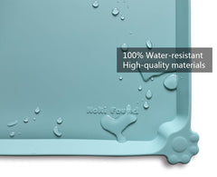 Hoki Found waterproof pet food mats guard carpets from spills.
