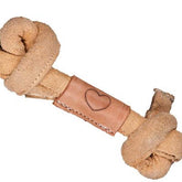 HuggleHounds Huggle-Hide Knotted Bone closeup reveals durable leather texture for tough chewers