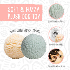HuggleHounds plush ball toy seafoam in action demonstrates engaging fetch sessions.