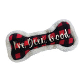 Huxley & Kent Power Plush bone toy with squeaker for engaging play.