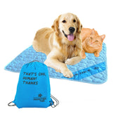 INSPECTOR TAIL self-cooling mat for dogs resting on a cozy bed.