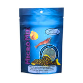Invert Aquatics Micro Mix with mini algae discs pouring for bottom feeders' quick nourishment