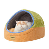 Jiupety cat bed top view shows a cozy green cave for indoor cats calm retreat.