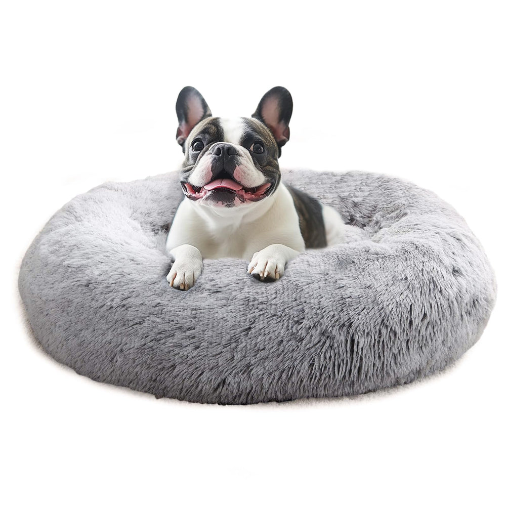JOLLYVOGUE calming donut dog bed in smoke grey offers round support for restful naps.