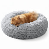 Cama calmante JOLLYVOGUE para perros pequeños con forma en dona para descanso seguro