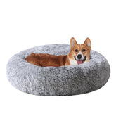 JOLLYVOGUE donut bed closeup shows plush fabric for cozy warmth.