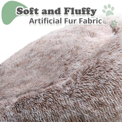 JOLLYVOGUE donut bed side view highlights raised border for head and neck support.