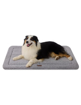 Joydeco low-profile crate mat folded in gray for snug crate comfort.