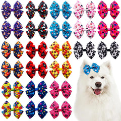 JpGdn big dog hair bow with paw-bone-red design adds festive flair during grooming