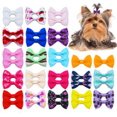JUCCPUL 40-piece dog bows with clips for versatile daily outfits.