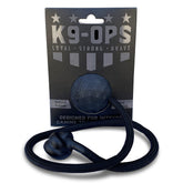 K9 Ops dog ball with hex design enhances grip for throwing and training.