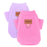 Kallfir's cutie 2-pack dog sweaters in pink and purple on a small dog for cozy warmth.