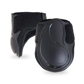 Kavallerie Classic Fetlock Boots on a horse during show jumping for protective support.