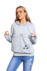 Kei Tomlison unisex pouch hoodie front pocket keeps a small pet secure.