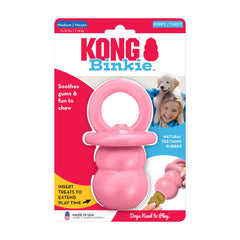 KONG Puppy Binkie in use while chewing to relieve boredom