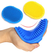 Kwispel adjustable-ring-handle dog grooming brush provides a secure grip for gentle baths.