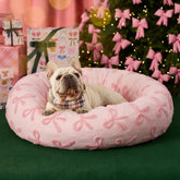 LE SURE donut bed close-up plush fabric delivers cloud-like comfort for small to medium pets.