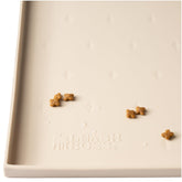 Leash Boss dog food mat waterproof beige 20x13 protects floors from spills during meals.
