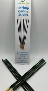 Liquid Gardens Shrimp Candy Stick on substrate delivers nutrient-rich feeding for shrimp.