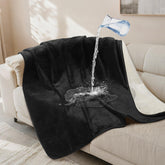 LOOBANI waterproof dog blanket on couch protects furniture from spills.